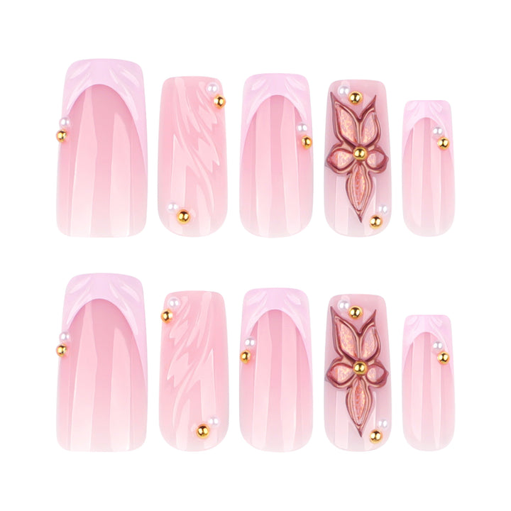 Artistic acrylic nails with flower design and glitter variations Bowlift