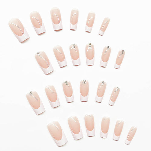Elegant artificial nail set with high-gloss finish and rhinestone decorations Bowlift