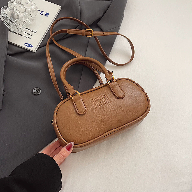 Textured Mini Handbag Bowlift