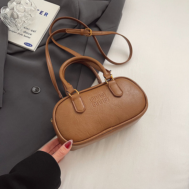 Textured Mini Handbag Bowlift