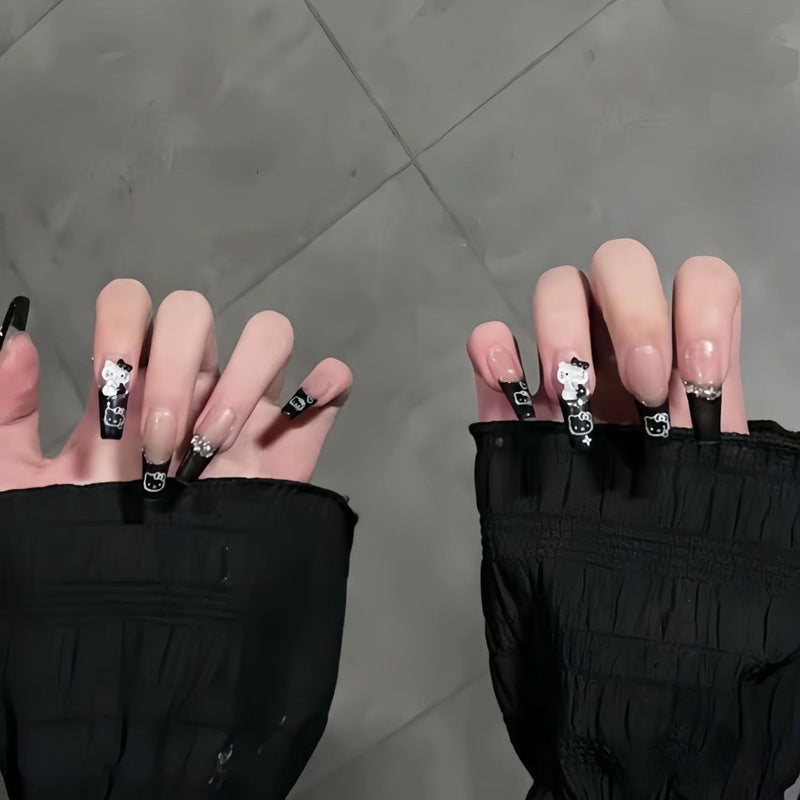 Artificial nail set with festive gift design and elegant glitter accents Bowlift