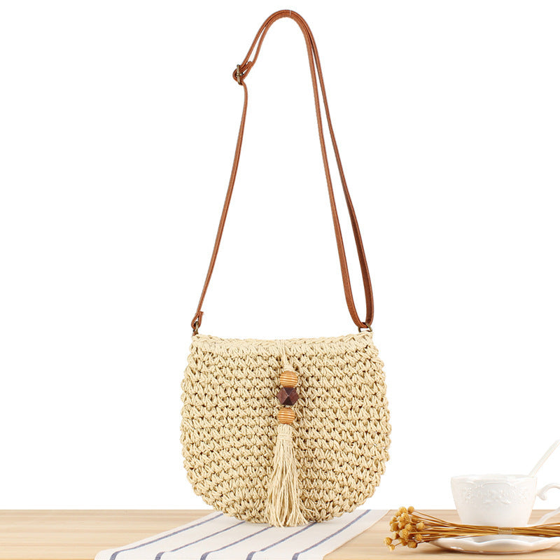 Braided shoulder bag with tassels and wooden decorations Bowlift