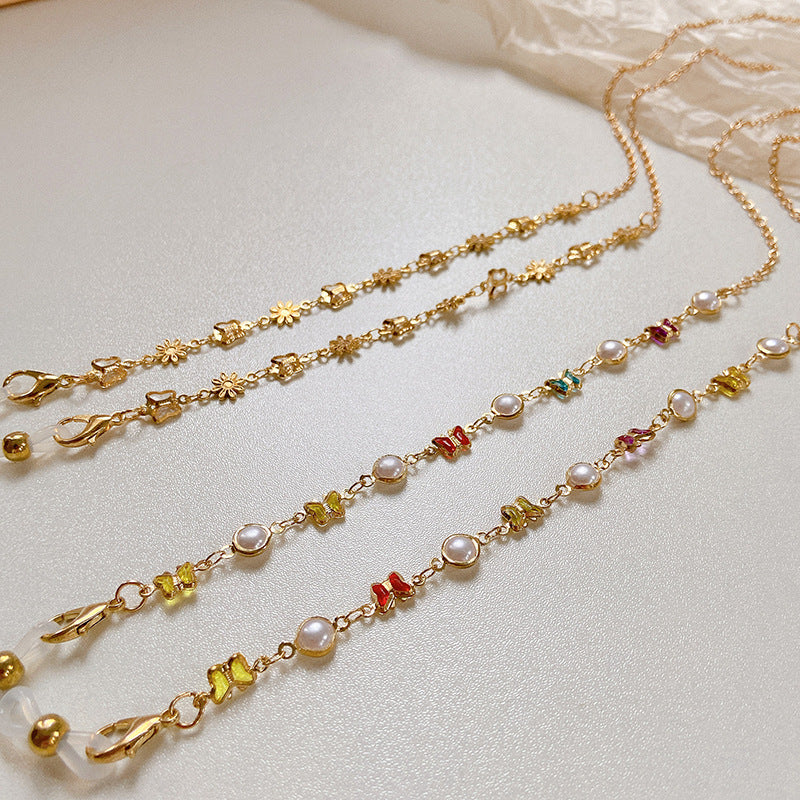 Stylized glasses holder chain with colorful crystals Bowlift