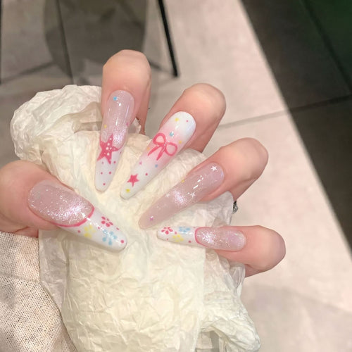 Artistic Press-On Nail Art Set with Charming Star and Bow Designs Bowlift