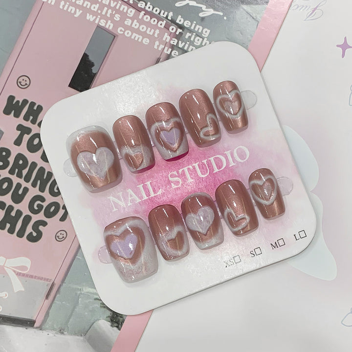 Artificial nail tips in heart design Bowlift