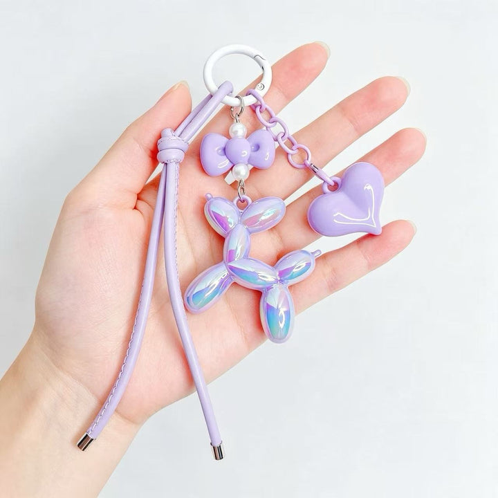 Playful keychain with heart and balloon dog Bowlift