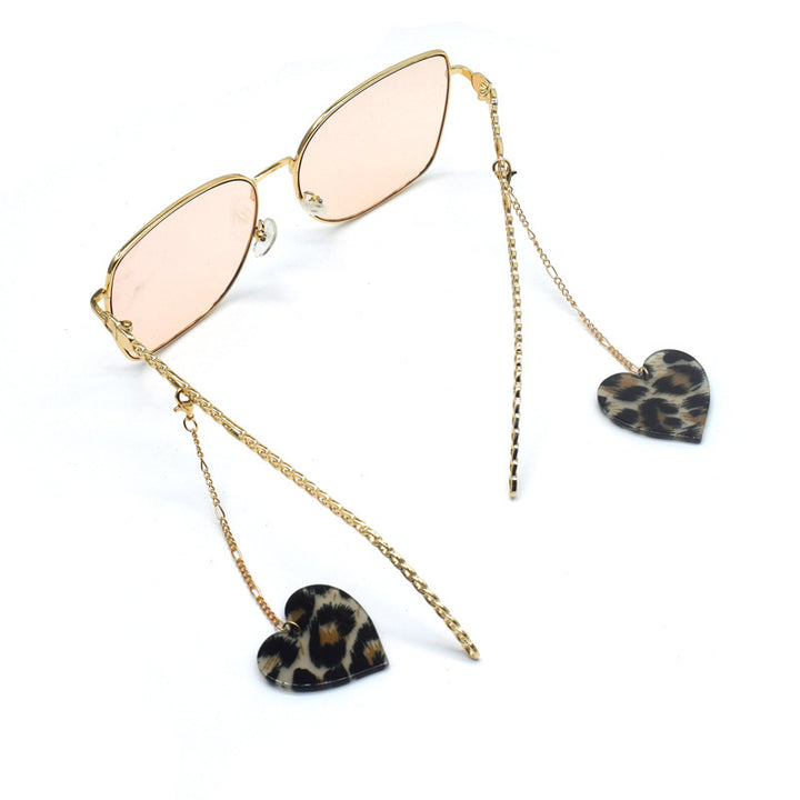 Heart-Shaped Dangle Earrings with Golden Chain Bowlift