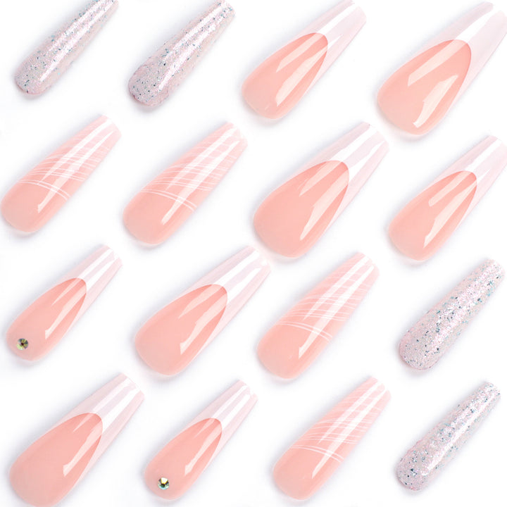 Artificial nail extensions with elegant glitter design Bowlift