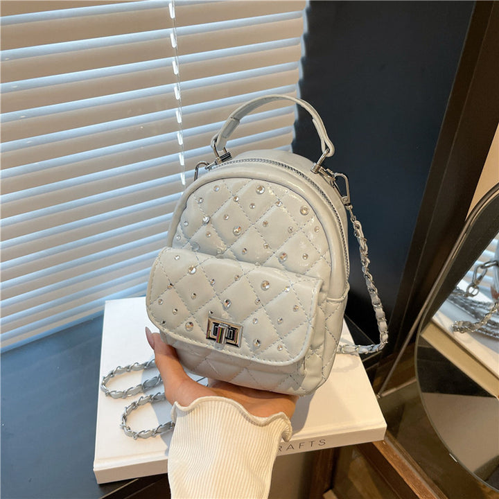 Quilted Mini Backpack with Rhinestone Accents Bowlift