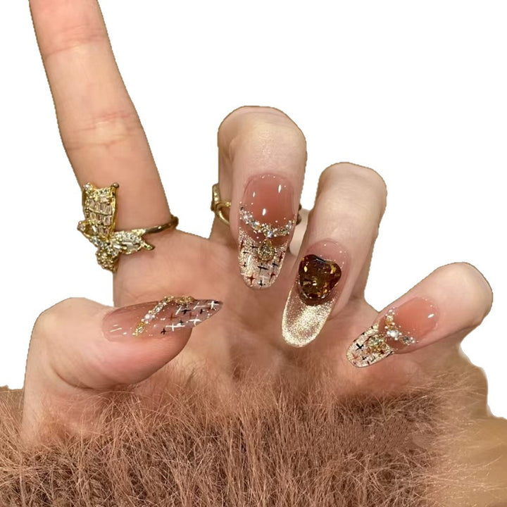 Artistic Long Stiletto Press-On Nails with Floral and Gemstone Accents Bowlift