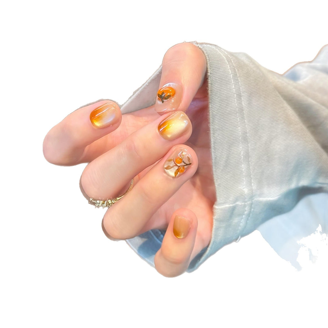 Artificial nails in elegant ombre look with floral accent Bowlift