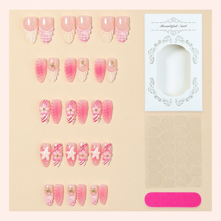 Artificial nail set with maritime motifs and glamorous accents Bowlift