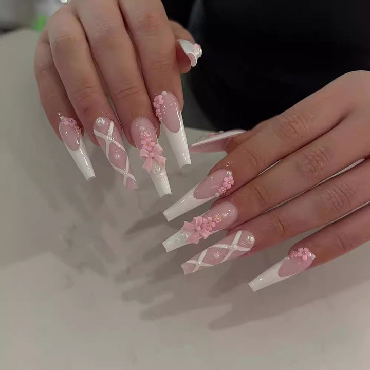 Artful and Elegant Stiletto Artificial Nails with Floral Design Bowlift