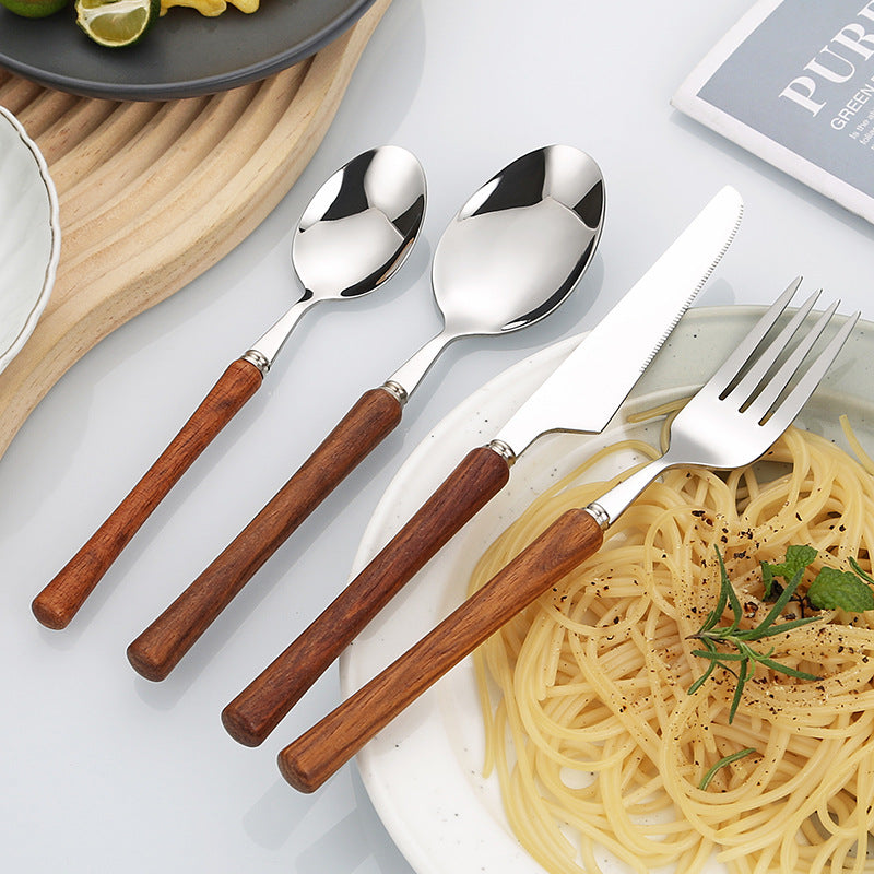 Elegant serving spoon with ergonomic wooden handle Bowlift