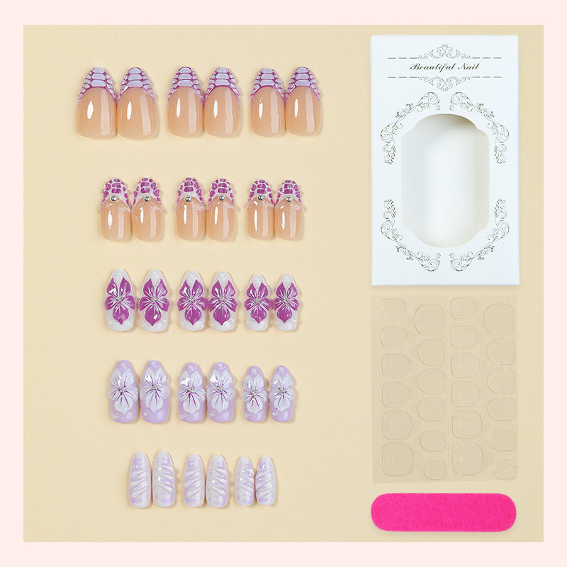 Artificial nail set with elegant flower designs and glitter accents Bowlift