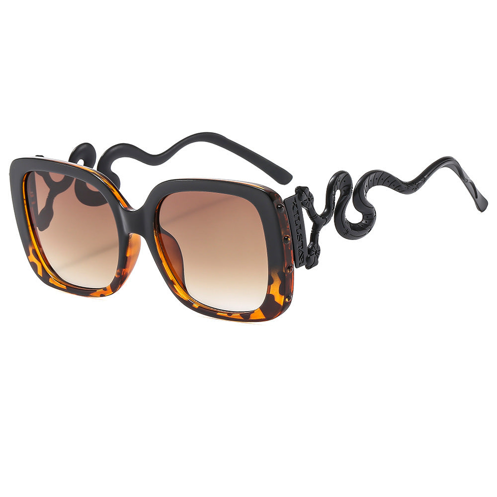 Women's extravagant designer sunglasses with luxurious snake frame Bowlift
