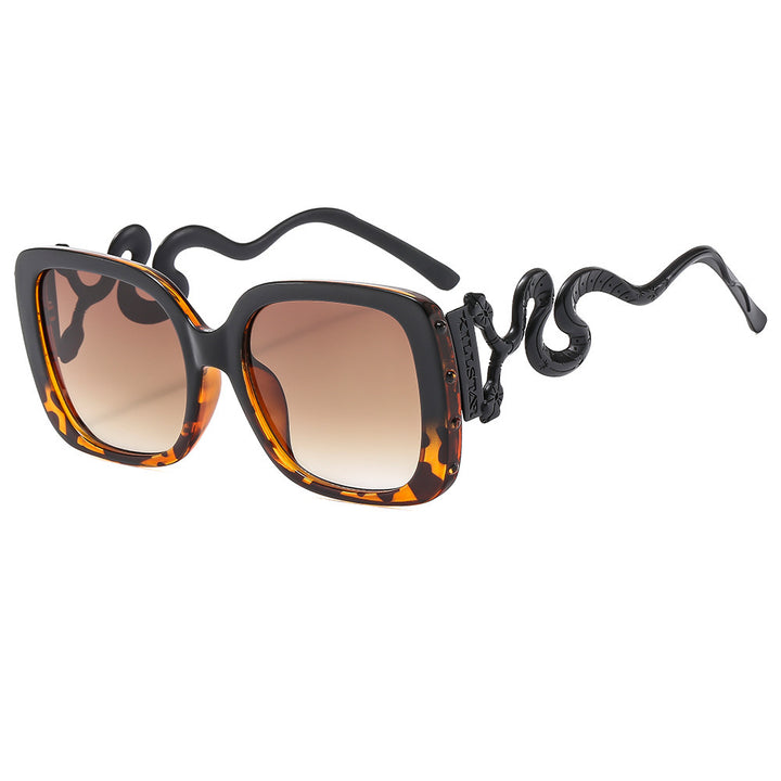 Women's extravagant designer sunglasses with luxurious snake frame Bowlift