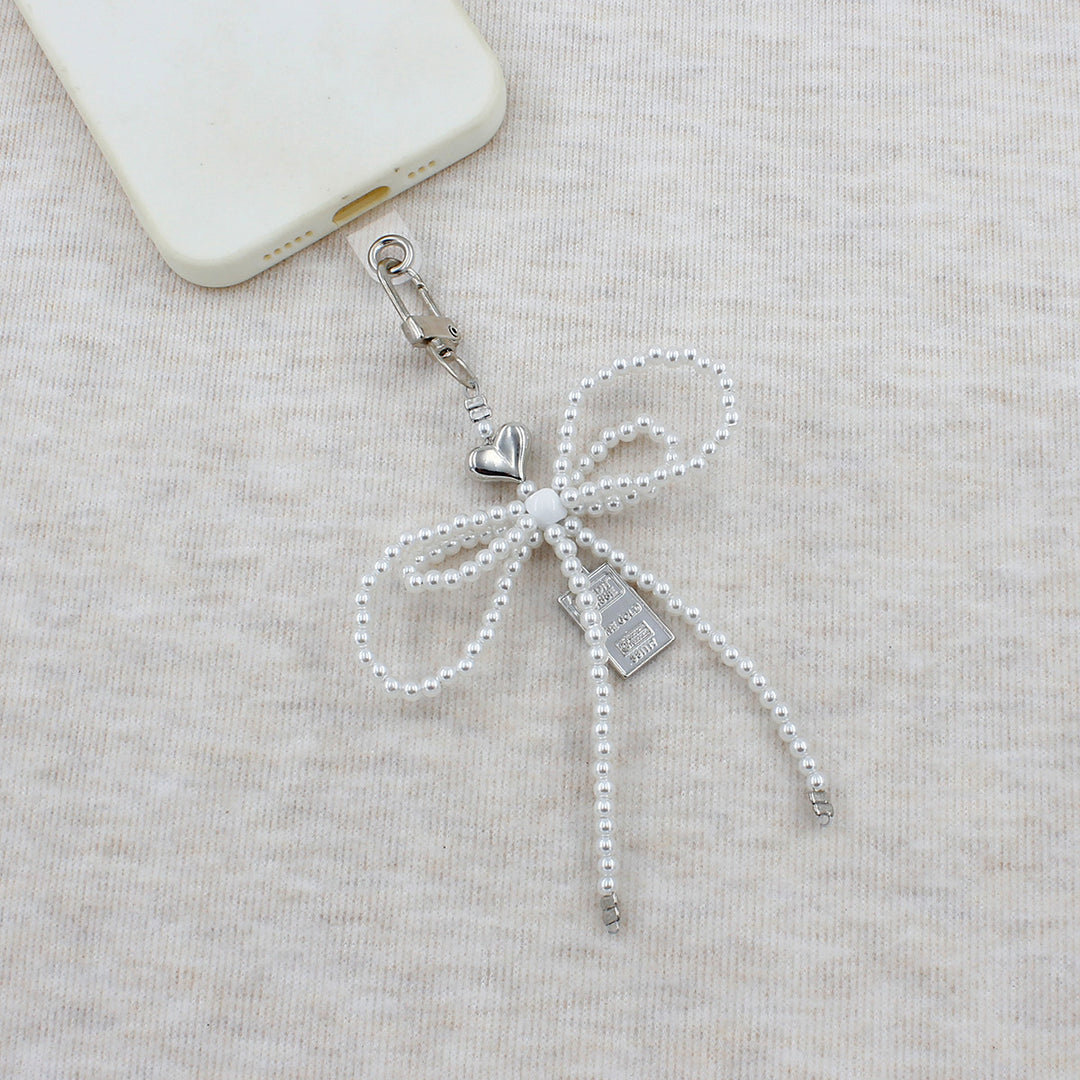 Elegant Beaded Bow Brooch Bowlift