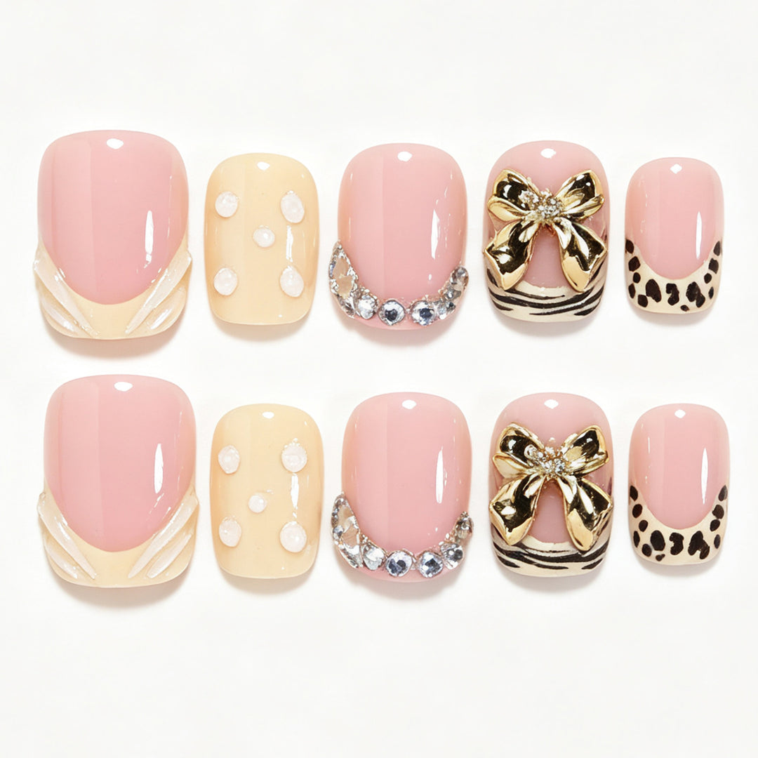 Artistic Press-On Nail Art Set with Decorative Accents Bowlift