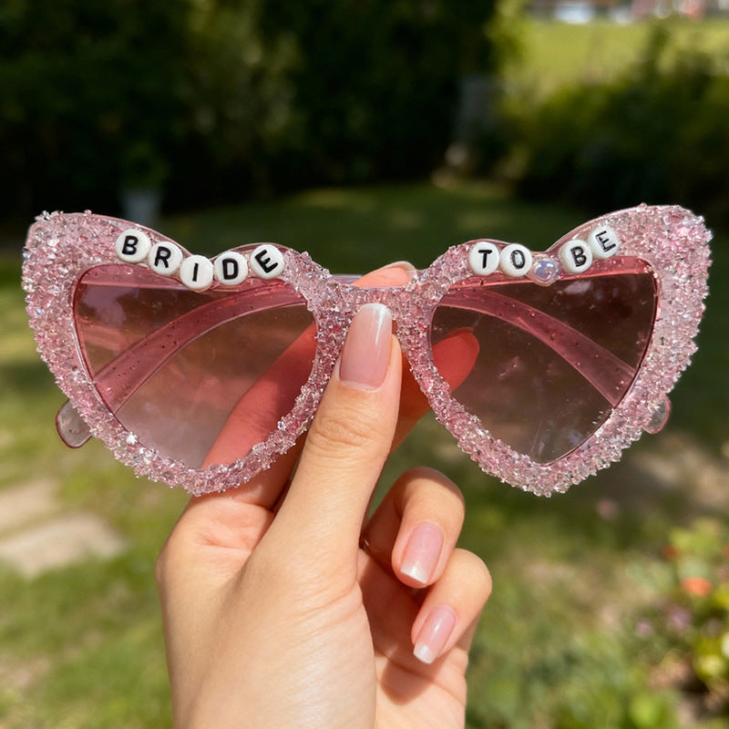 Heart-Shaped Celebration Sunglasses Bowlift