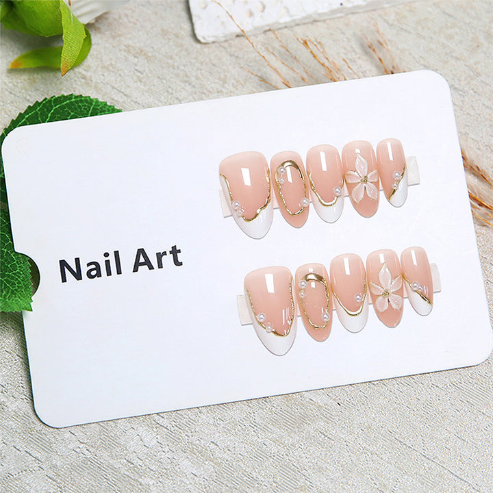 Artistic nail tips with elegant pearl design Bowlift