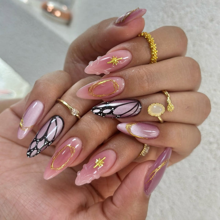 Artful acrylic nails with elegant floral accents Bowlift
