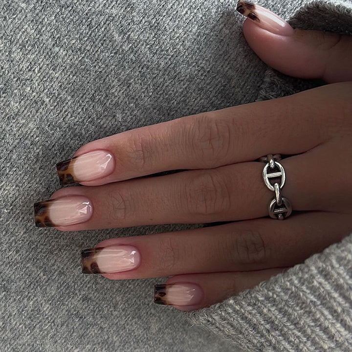 Artistic acrylic nails with elegant ombre design Bowlift