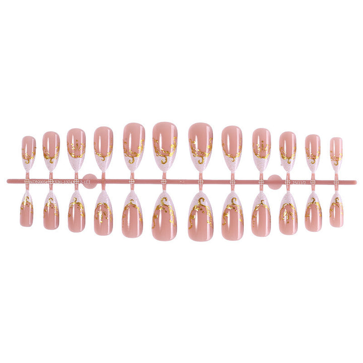 Artificial nail set with elegant gold accents and transparent design Bowlift