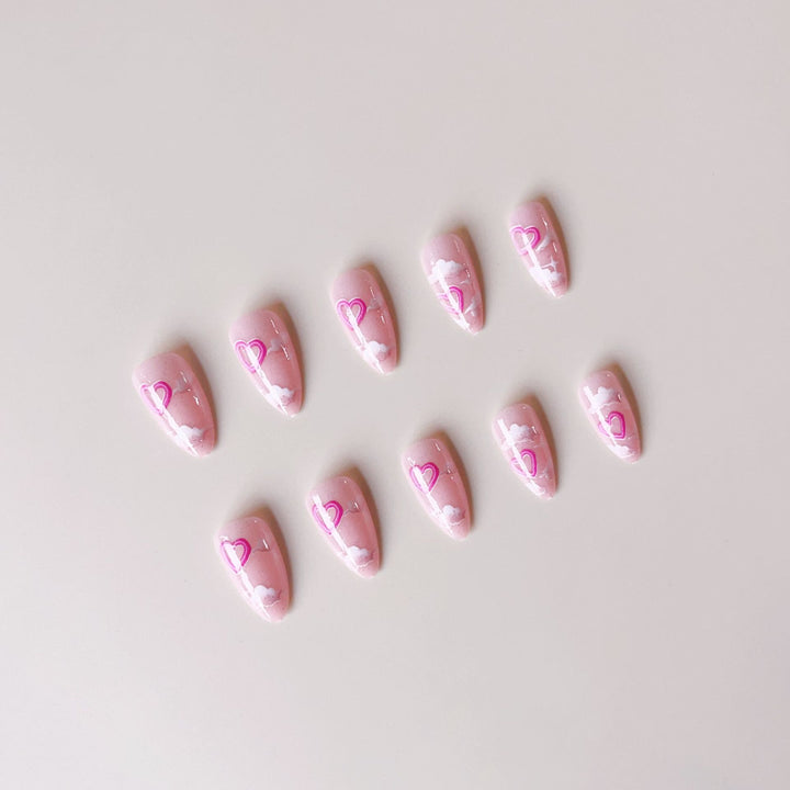 Artificial nail set with romantic heart accents and sparkling finish Bowlift