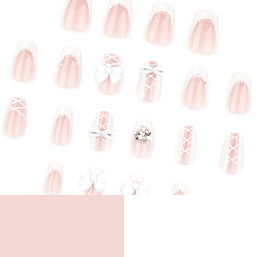 Artful Nail Art with Bows and Rhinestone Decorations Bowlift