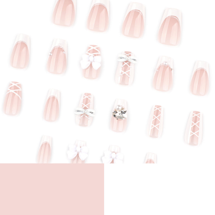 Artful Nail Art with Bows and Rhinestone Decorations Bowlift
