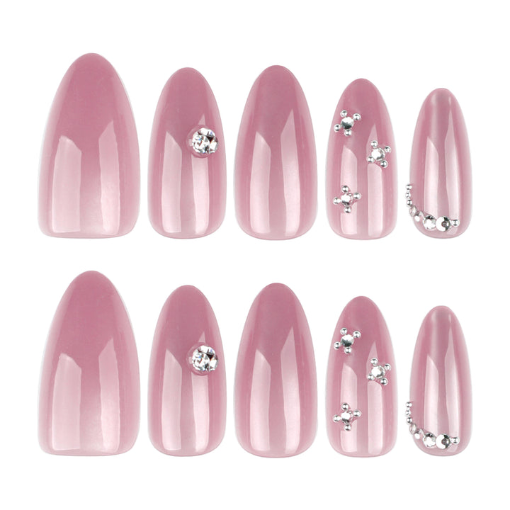 Artificial nail art with glitter embellishments Bowlift
