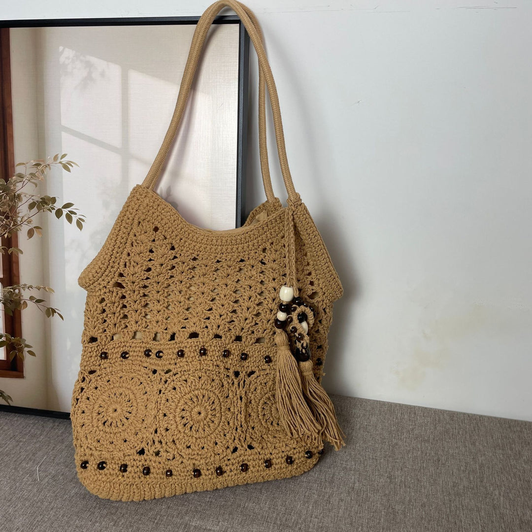 Hand-crocheted shoulder bag with unique fringe design Bowlift