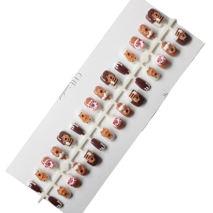 Playful art fake nails with animal motifs Bowlift