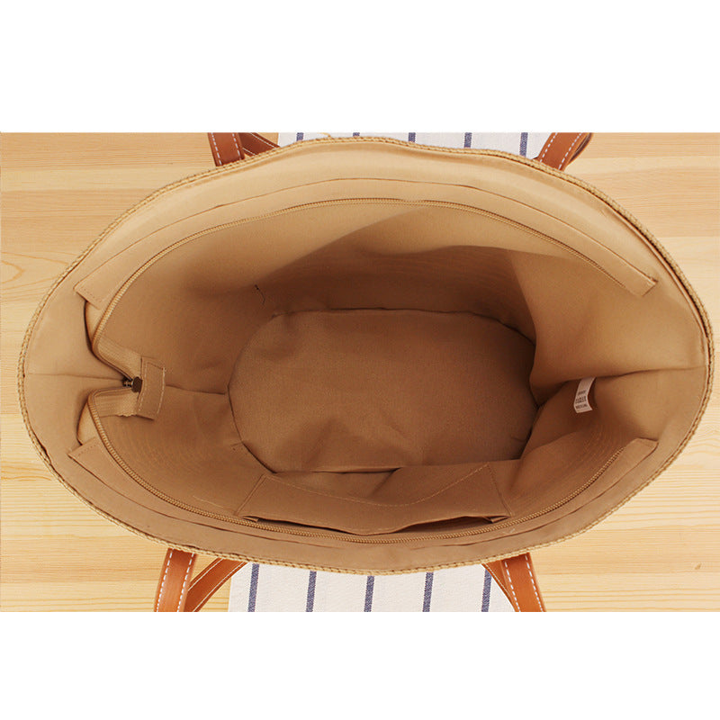 Straw bag in modern stripe look Bowlift