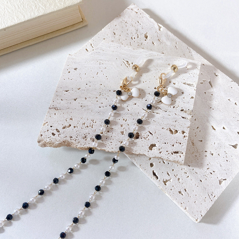 Elegant earrings with pearls and flower pendants Bowlift