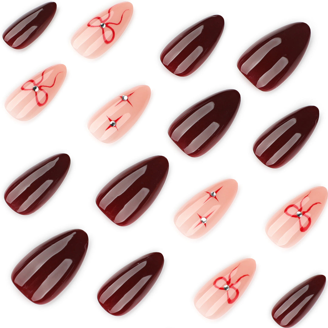 Artful nail art with elegant bows and rhinestone embellishments Bowlift