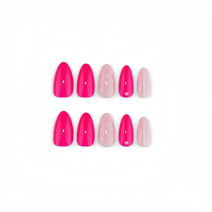 Artificial nails in playful design with hearts and dots Bowlift