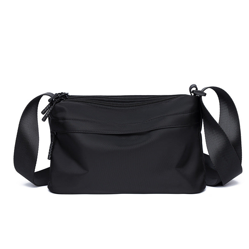 Practical shoulder bag with multiple compartments Bowlift