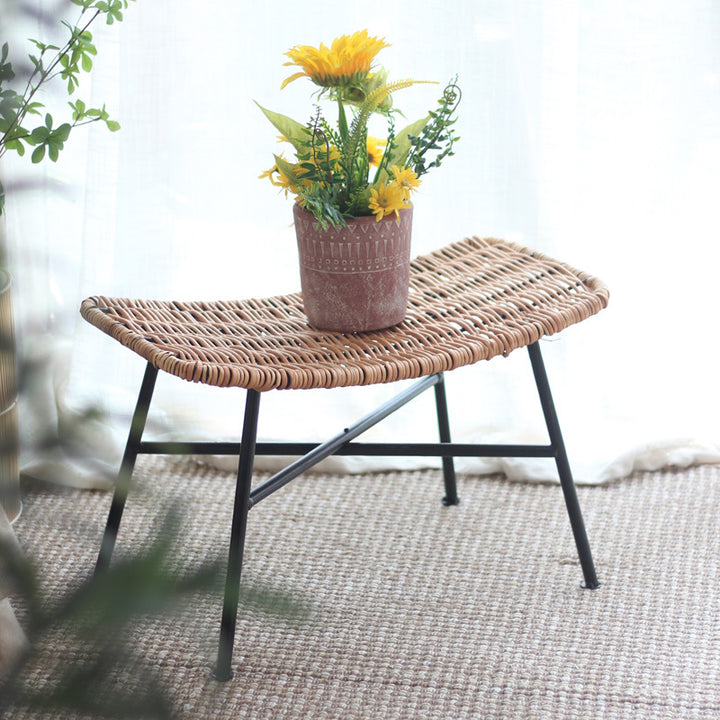 Modern Stool made of woven rattan Bowlift