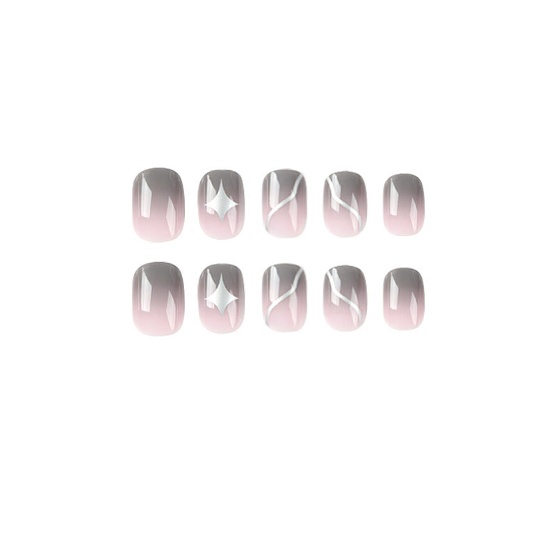 Artificial nail art with elegant ombre design and charming accents Bowlift