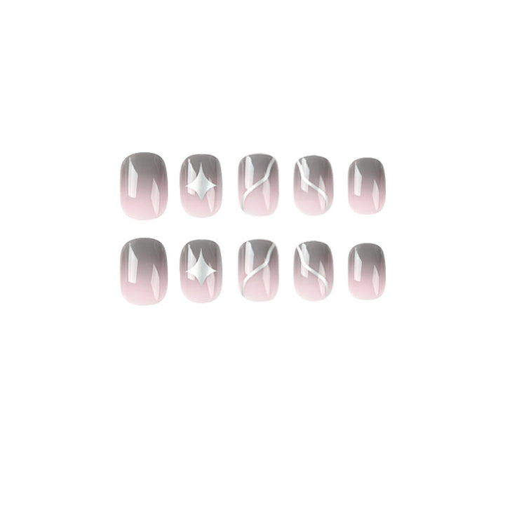 Artificial nail art with elegant ombre design and charming accents Bowlift