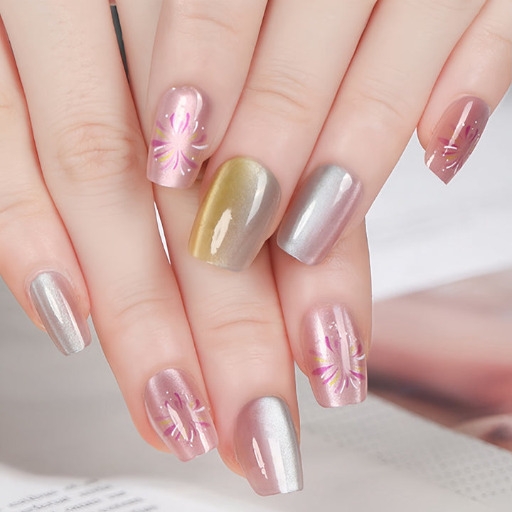 Artificial nails in modern ombre design with floral accents Bowlift