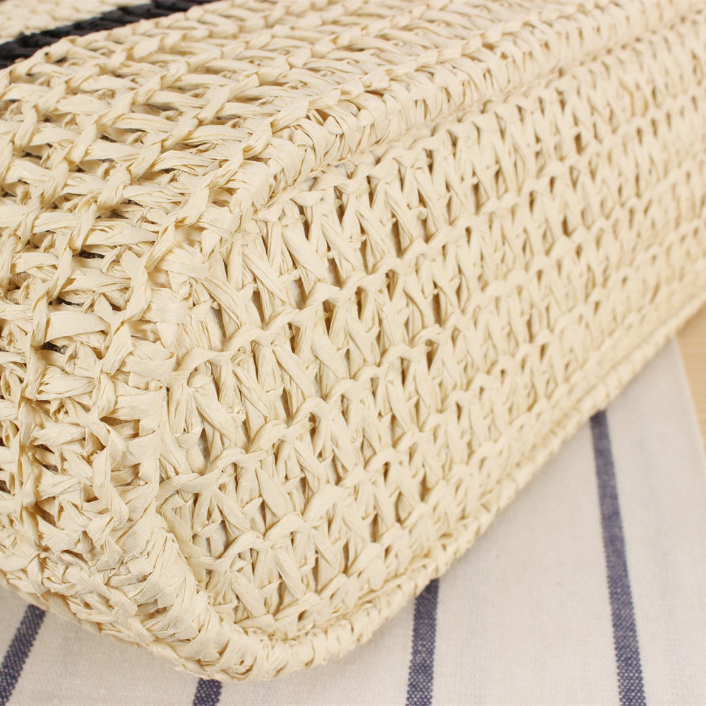 Fashionable beach bag made of woven natural material with elegant straps Bowlift