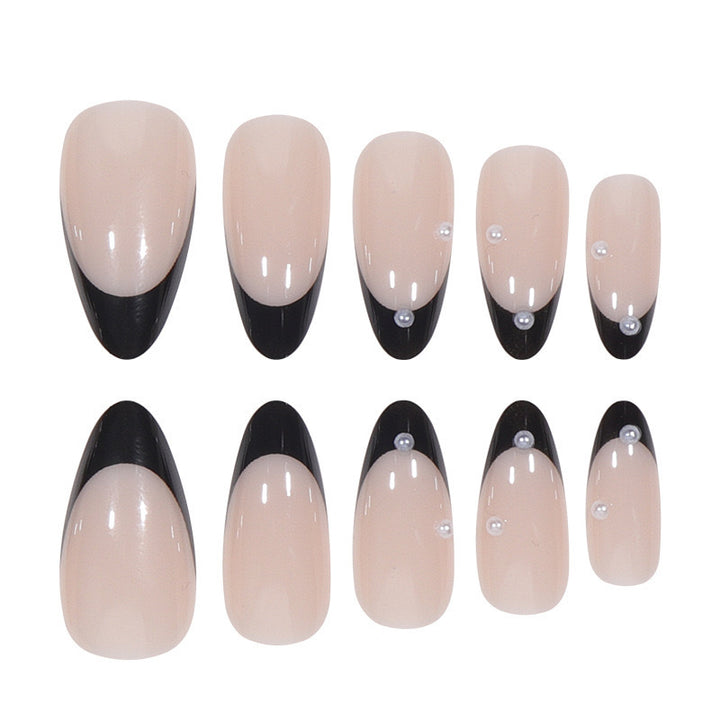 Artificial nail set with glossy French design and delicate 3D accents Bowlift