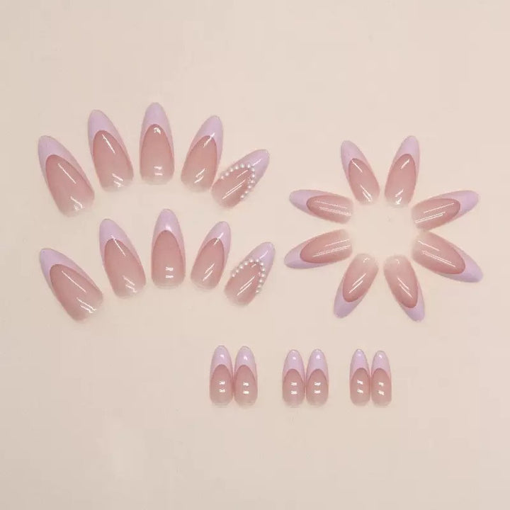 Elegant artificial nail tips with glitter and pearl decorations Bowlift
