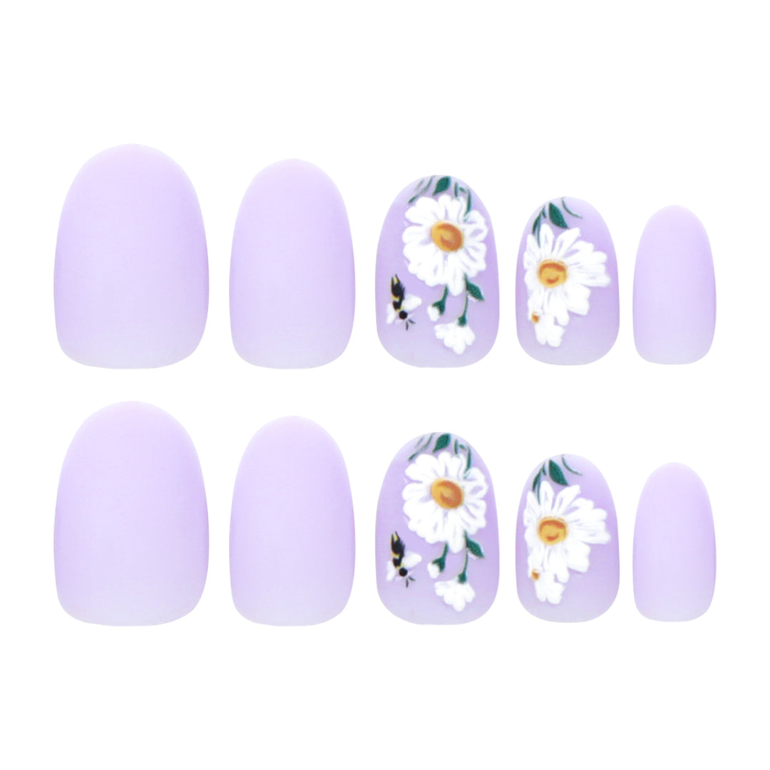 Artistic nail design with delicate floral elements Bowlift