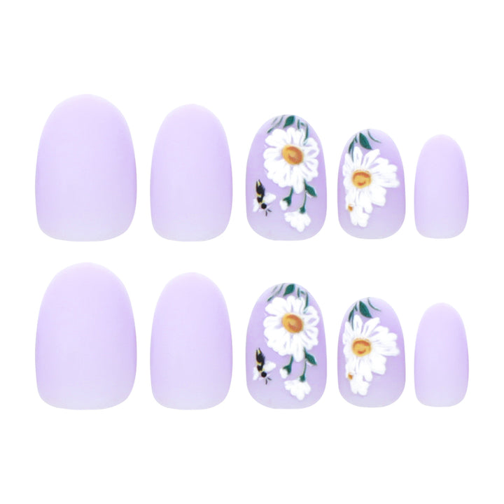 Artistic nail design with delicate floral elements Bowlift