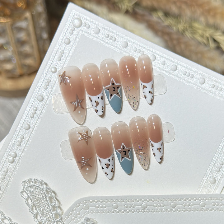 Elegant Stiletto Press-On Nail Set with Artistic Accents Bowlift