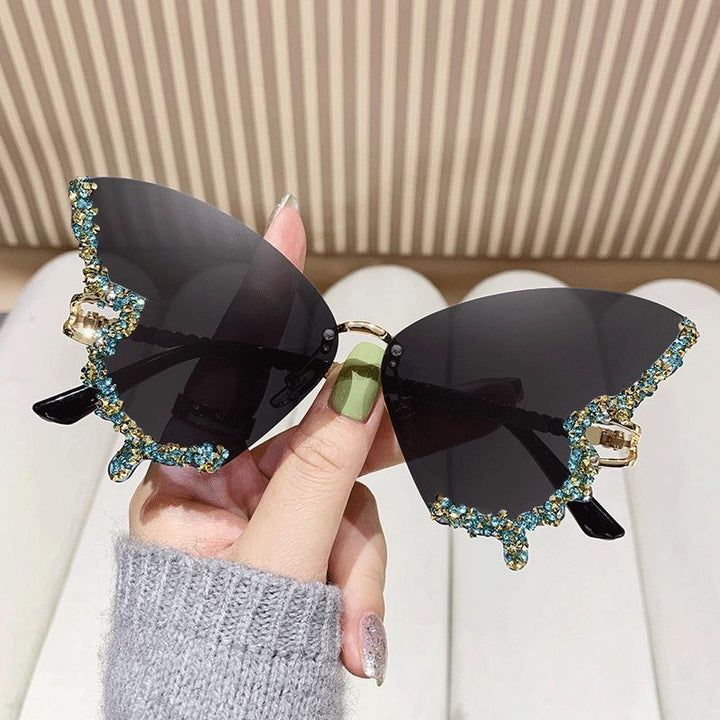 Women's extravagant sunglasses with sparkling butterfly design Bowlift